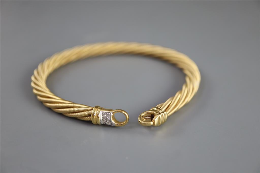 A Wellendorf 18ct. gold cable twist link bracelet with diamond set clasp,